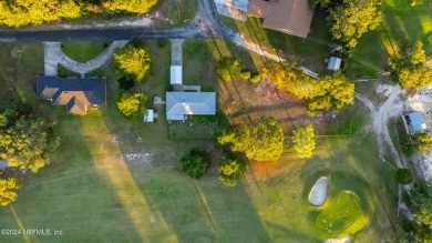 Welcome to this charming two-bedroom, one-bath home overlooking on Keystone Heights Golf and Country Club in Florida - for sale on GolfHomes.com, golf home, golf lot