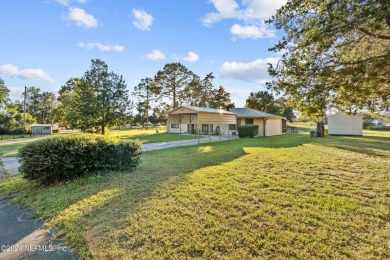 Welcome to this charming two-bedroom, one-bath home overlooking on Keystone Heights Golf and Country Club in Florida - for sale on GolfHomes.com, golf home, golf lot