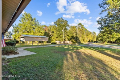 Welcome to this charming two-bedroom, one-bath home overlooking on Keystone Heights Golf and Country Club in Florida - for sale on GolfHomes.com, golf home, golf lot