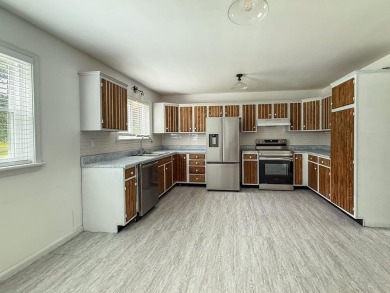 This 3 bedroom 2 bath home sits on almost one acre with peaceful on Eastern Shore Yacht and Country Club in Virginia - for sale on GolfHomes.com, golf home, golf lot