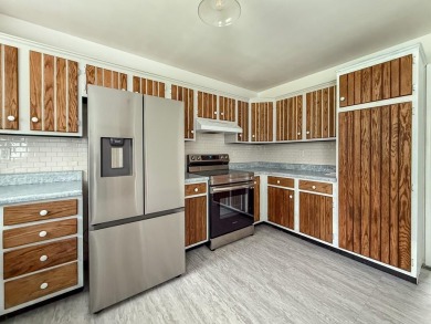 This 3 bedroom 2 bath home sits on almost one acre with peaceful on Eastern Shore Yacht and Country Club in Virginia - for sale on GolfHomes.com, golf home, golf lot