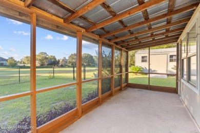 Welcome to this charming two-bedroom, one-bath home overlooking on Keystone Heights Golf and Country Club in Florida - for sale on GolfHomes.com, golf home, golf lot