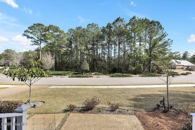 Welcome to this charming home with an inviting, rocking on Cape Fear National At Brunswick Forest in North Carolina - for sale on GolfHomes.com, golf home, golf lot