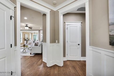 Welcome to this charming home with an inviting, rocking on Cape Fear National At Brunswick Forest in North Carolina - for sale on GolfHomes.com, golf home, golf lot