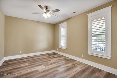 Welcome to this charming home with an inviting, rocking on Cape Fear National At Brunswick Forest in North Carolina - for sale on GolfHomes.com, golf home, golf lot