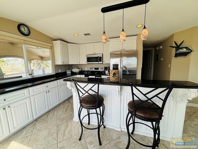 Golf course beauty with huge windows framing stunning views on Long Island Golf Course in Texas - for sale on GolfHomes.com, golf home, golf lot