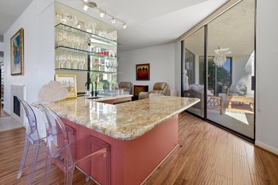 Step into this beautiful ground-floor condo at Desert Island on Desert Island Golf and Country Club in California - for sale on GolfHomes.com, golf home, golf lot