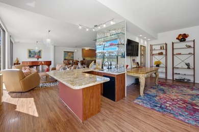 Step into this beautiful ground-floor condo at Desert Island on Desert Island Golf and Country Club in California - for sale on GolfHomes.com, golf home, golf lot