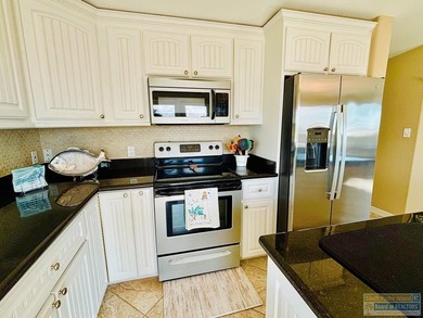 Golf course beauty with huge windows framing stunning views on Long Island Golf Course in Texas - for sale on GolfHomes.com, golf home, golf lot