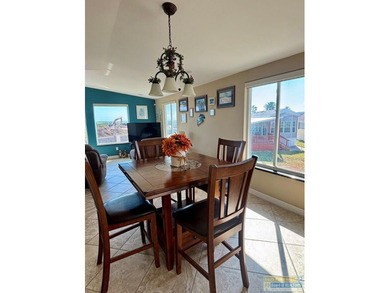 Golf course beauty with huge windows framing stunning views on Long Island Golf Course in Texas - for sale on GolfHomes.com, golf home, golf lot