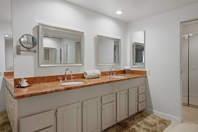 Step into this beautiful ground-floor condo at Desert Island on Desert Island Golf and Country Club in California - for sale on GolfHomes.com, golf home, golf lot