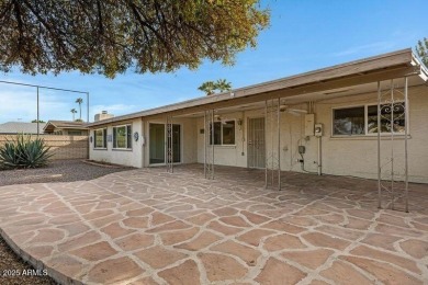 This 1,900+ sq. ft. brick home is situated on the golf course on Arizona Golf Resort and Conference Center in Arizona - for sale on GolfHomes.com, golf home, golf lot