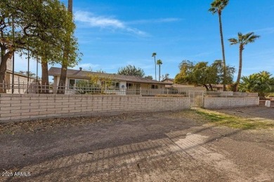 This 1,900+ sq. ft. brick home is situated on the golf course on Arizona Golf Resort and Conference Center in Arizona - for sale on GolfHomes.com, golf home, golf lot