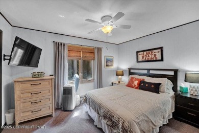 Turnkey Contemporary in the Heart of Lake Harmony - This on Split Rock Resort and Country Club in Pennsylvania - for sale on GolfHomes.com, golf home, golf lot