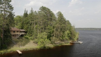 Furnished Lake Eshquaguma 3BR Yr Round Lake Home Built By on Eshquaguma Country Club in Minnesota - for sale on GolfHomes.com, golf home, golf lot