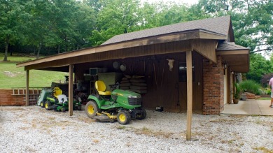 Nestled among impressive oaks and pines this beautifully on Oakridge Golf Course in Arkansas - for sale on GolfHomes.com, golf home, golf lot