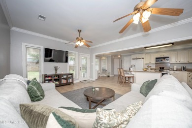 WELCOME HOME!  This beautiful well maintained home sits on a on Diamondhead Country Club in Mississippi - for sale on GolfHomes.com, golf home, golf lot