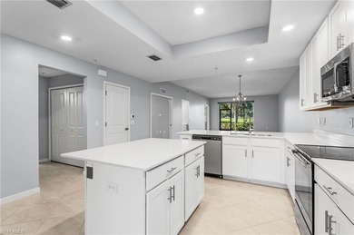 BUNDLED GOLF INCLUDED! Welcome to effortless resort-style living on Panther Run Golf Club in Florida - for sale on GolfHomes.com, golf home, golf lot