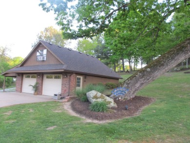 Nestled among impressive oaks and pines this beautifully on Oakridge Golf Course in Arkansas - for sale on GolfHomes.com, golf home, golf lot