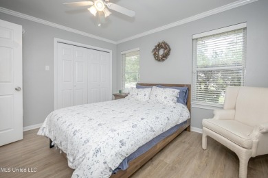 WELCOME HOME!  This beautiful well maintained home sits on a on Diamondhead Country Club in Mississippi - for sale on GolfHomes.com, golf home, golf lot