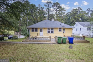 Step into this delightful home brimming with character and ready on Alfred Tup Holmes Golf Course in Georgia - for sale on GolfHomes.com, golf home, golf lot