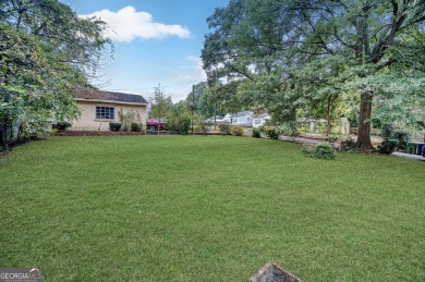 Step into this delightful home brimming with character and ready on Alfred Tup Holmes Golf Course in Georgia - for sale on GolfHomes.com, golf home, golf lot