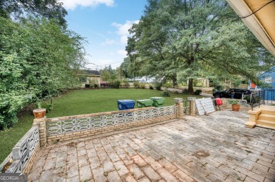 Step into this delightful home brimming with character and ready on Alfred Tup Holmes Golf Course in Georgia - for sale on GolfHomes.com, golf home, golf lot