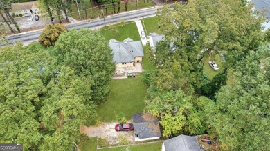 Step into this delightful home brimming with character and ready on Alfred Tup Holmes Golf Course in Georgia - for sale on GolfHomes.com, golf home, golf lot