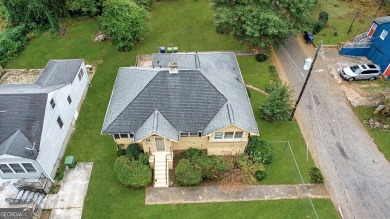 Step into this delightful home brimming with character and ready on Alfred Tup Holmes Golf Course in Georgia - for sale on GolfHomes.com, golf home, golf lot