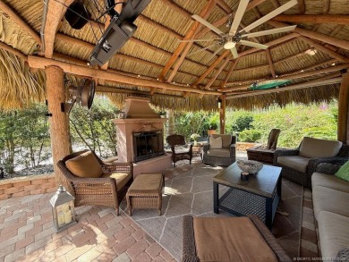 YOUR TROPICAL OASIS AWAITS! Ideally situated near the north on Motorcoach Resort Golf Course in Florida - for sale on GolfHomes.com, golf home, golf lot