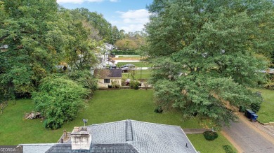 Step into this delightful home brimming with character and ready on Alfred Tup Holmes Golf Course in Georgia - for sale on GolfHomes.com, golf home, golf lot