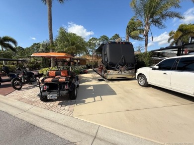 YOUR TROPICAL OASIS AWAITS! Ideally situated near the north on Motorcoach Resort Golf Course in Florida - for sale on GolfHomes.com, golf home, golf lot