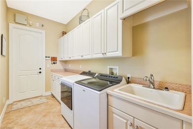 Designed for ultimate privacy and indoor-outdoor living, this on The Colony Golf and Country Club in Florida - for sale on GolfHomes.com, golf home, golf lot