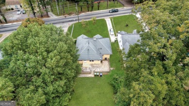 Step into this delightful home brimming with character and ready on Alfred Tup Holmes Golf Course in Georgia - for sale on GolfHomes.com, golf home, golf lot