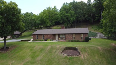 Nestled among impressive oaks and pines this beautifully on Oakridge Golf Course in Arkansas - for sale on GolfHomes.com, golf home, golf lot