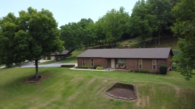 Nestled among impressive oaks and pines this beautifully on Oakridge Golf Course in Arkansas - for sale on GolfHomes.com, golf home, golf lot