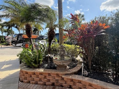 YOUR TROPICAL OASIS AWAITS! Ideally situated near the north on Motorcoach Resort Golf Course in Florida - for sale on GolfHomes.com, golf home, golf lot