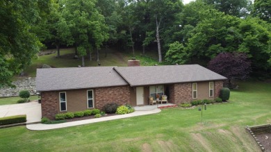 Nestled among impressive oaks and pines this beautifully on Oakridge Golf Course in Arkansas - for sale on GolfHomes.com, golf home, golf lot