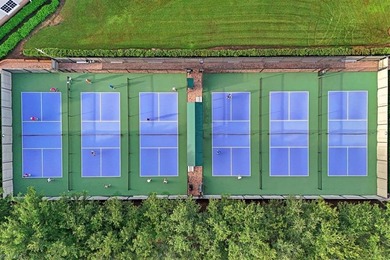 Designed for ultimate privacy and indoor-outdoor living, this on The Colony Golf and Country Club in Florida - for sale on GolfHomes.com, golf home, golf lot