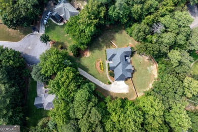 Exceptionally private 1+ acre setting ranch home w/ HUGE on Collins Hill Golf Club in Georgia - for sale on GolfHomes.com, golf home, golf lot