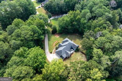 Exceptionally private 1+ acre setting ranch home w/ HUGE on Collins Hill Golf Club in Georgia - for sale on GolfHomes.com, golf home, golf lot