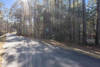 0.46 acre Waterfront Lot with stunning views and a quiet on Woodlake Country Club in North Carolina - for sale on GolfHomes.com, golf home, golf lot