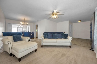 Single-story 3-bedroom, 2-bath, 2-car garage home in the Beacon on Beacon Woods Golf Club in Florida - for sale on GolfHomes.com, golf home, golf lot