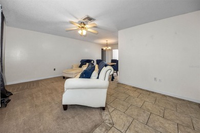 Single-story 3-bedroom, 2-bath, 2-car garage home in the Beacon on Beacon Woods Golf Club in Florida - for sale on GolfHomes.com, golf home, golf lot