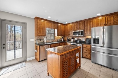 Welcome to this meticulously maintained 3-bedroom, 2-bathroom on The Highlands Course at Lake Arrowhead in Georgia - for sale on GolfHomes.com, golf home, golf lot