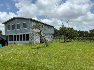 A big house on a big lot for this section of Holiday Beach! on Lamar Golf Course in Texas - for sale on GolfHomes.com, golf home, golf lot