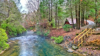 Nature abounds at this furnished cabin nestled on the banks of on White Path Golf Club in Georgia - for sale on GolfHomes.com, golf home, golf lot