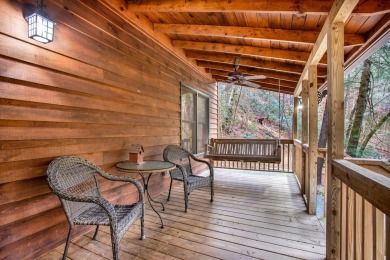 Nature abounds at this furnished cabin nestled on the banks of on White Path Golf Club in Georgia - for sale on GolfHomes.com, golf home, golf lot