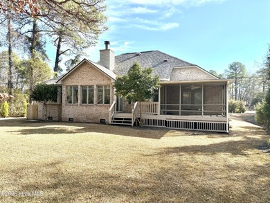 This beautiful brick home is ideally positioned on Fairfield on Harbour Point Golf Club in North Carolina - for sale on GolfHomes.com, golf home, golf lot