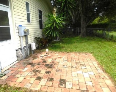 GOLF CART* COMES WITH SALE  PRIVACY PLUS!!   NO NEIGHBORS AT THE on East Bay Golf Club in Florida - for sale on GolfHomes.com, golf home, golf lot